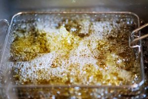 What Happens When You Put Ice In A Deep Fryer? cause bubbles in the oil and raise it.