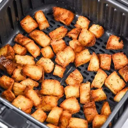 Air Fryer Croutons in the air fryer basket